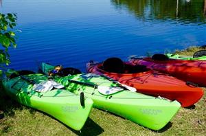 Kayaks By The Lake